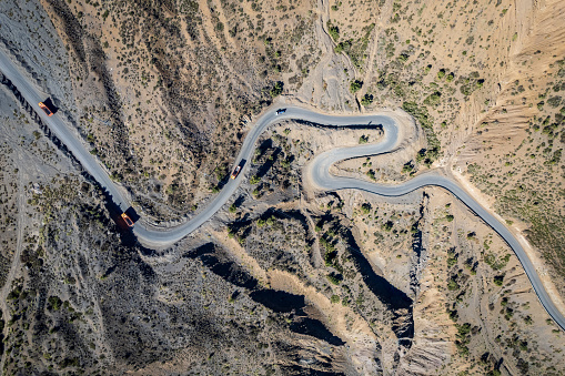 Aerial view of a road running through the valleys of Cajon del Maipo in central Chile Andes