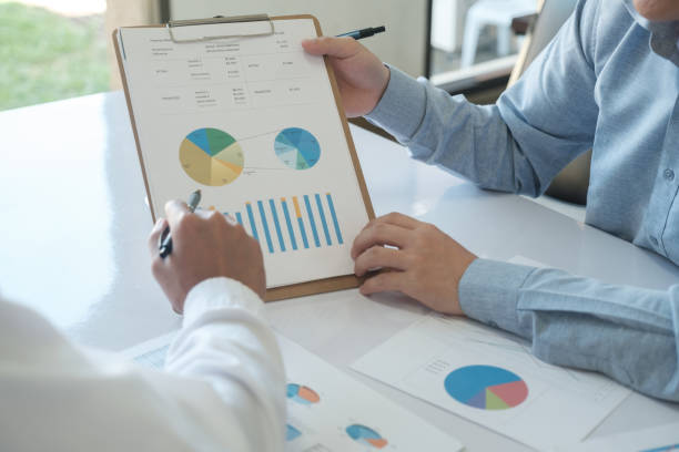 istock Businessman analyzing investment 2142132343