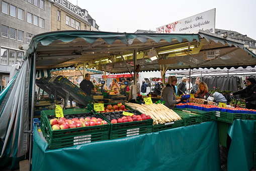 Bonn, Germany, March 30, 2024 - Weekly market on the market square in Bonn city center.