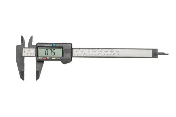 Photo of Electronic vernier caliper isolated on a white background.