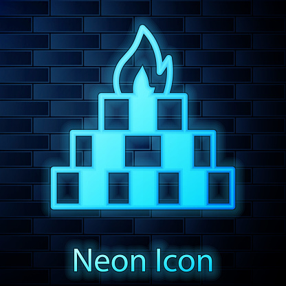 Glowing neon Yagna icon isolated on brick wall background. Vector.