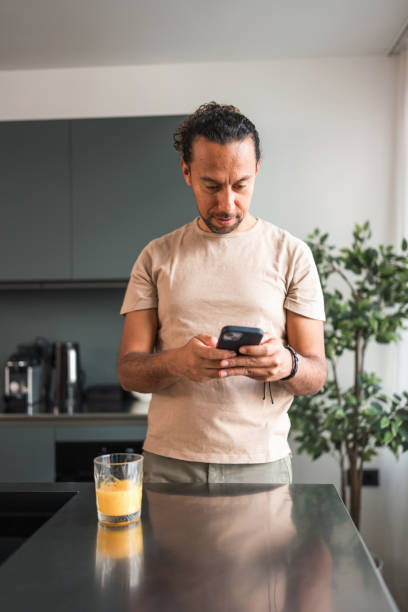 istock Hispanic Man Engages in Online Shopping Using Smartphone 2142474314