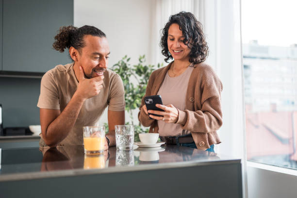 istock Hispanic Couple Engaged in Online Shopping 2142474324