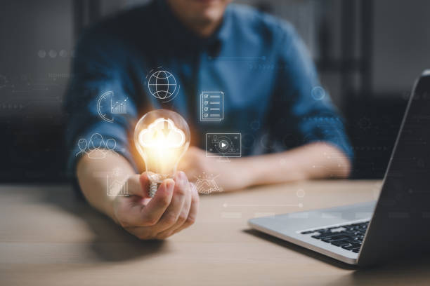 istock Man hand holding Light bulb Global Internet connection. Business global internet connection application technology and digital marketing, Financial and banking, Digital link tech, big data. 2142501891