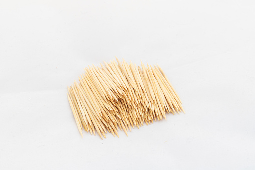 Sharp thin pointed ends toothpicks on white isolated background