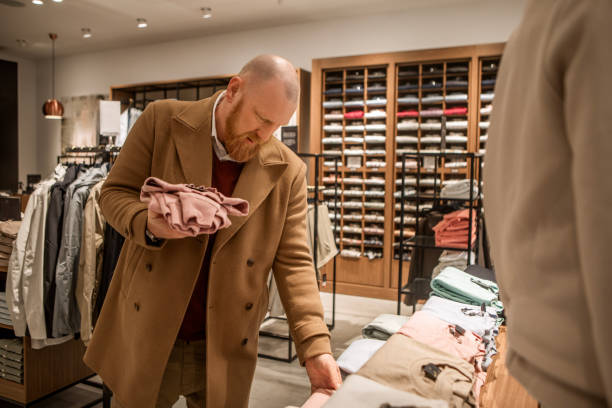 istock Handsome man shopping alone on a day trip 2142566301