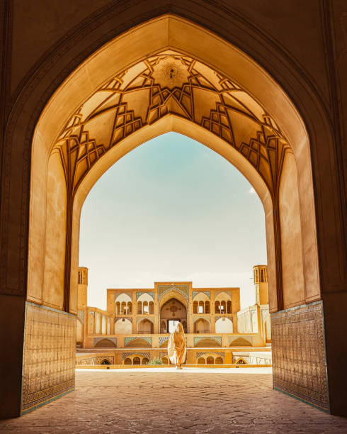 istock Tourists and pilgrims explore sightseeing beautiful Agha Bozorg Mosque 2142601533