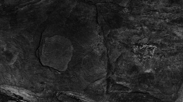 istock Dark rough stone wall background in vintage style for graphic design 2142614629