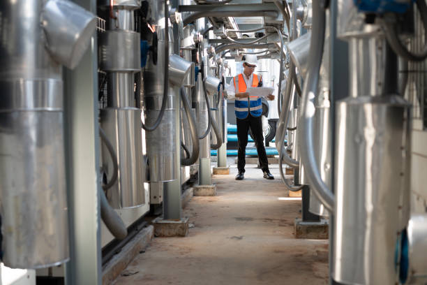 istock Engineers are inspecting a large building or industrial facility's cooling system for the air conditioning. 2142638129