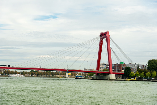 Skyline of Rotterdam from a boat with Williams Bridge. Willemsbrug