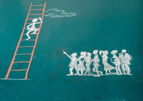 Stick figure climbing ladder to success