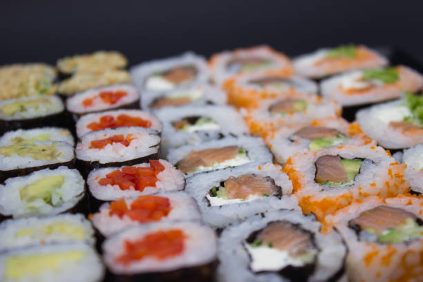 istock Sushi Feast on a Black Plate 2142725191