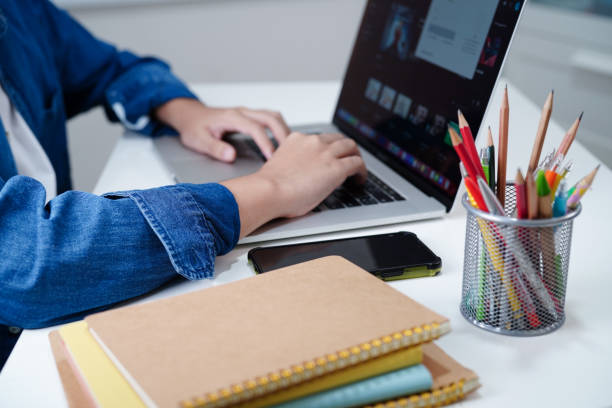 istock Asian teenage student write homework with laptop computer, learning university education concept. 2142791573