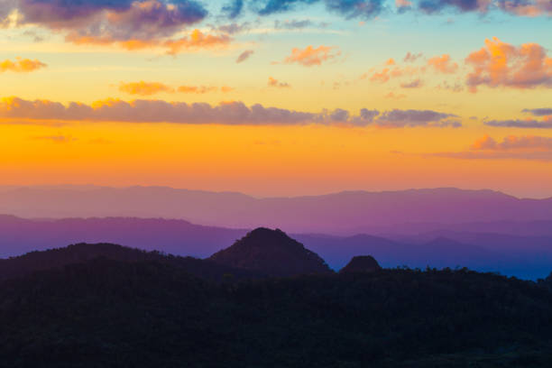 Sunset on the top of mountain tropical forest colourful sky cloud, Nature landscape silhouette