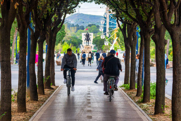 Image of a bycicle lane with cylists leading to Skanderbeg Square in Tirane Albania