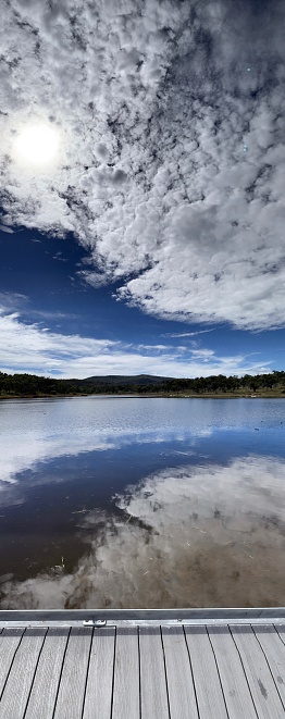 Reflection of sky and cloud on Dumaresq Dam Armidale NSW