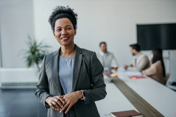 istock Businesswoman standing in a modern office 2142942295