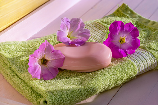 Pink Soap, pink flowers. Garden petunia. SPA, hygiene products.