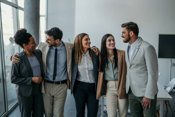 istock Embraced group of business people 2142948608
