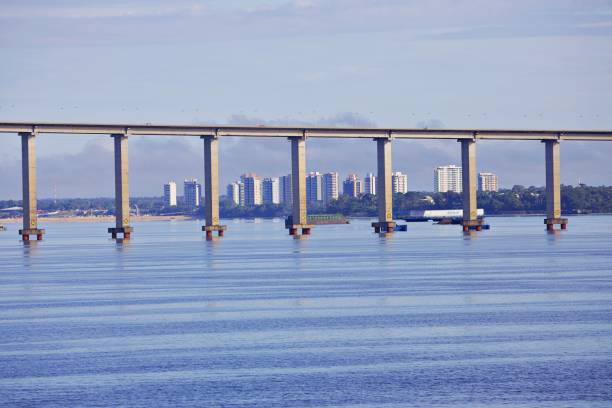 istock Huge suspension bridge over water 2142959848