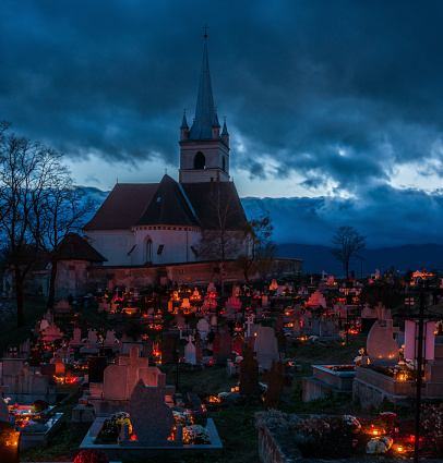 Night cemetery on All Saints' Day in Romania, Transylvania.