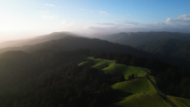Aerial video over green hills in the Marin County area