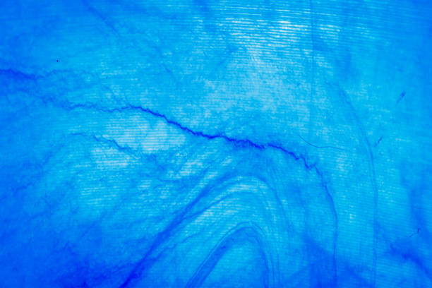 Macro shot of blue marbled vinyl record. Surface of an old vinyl record. Shallow depth of field.