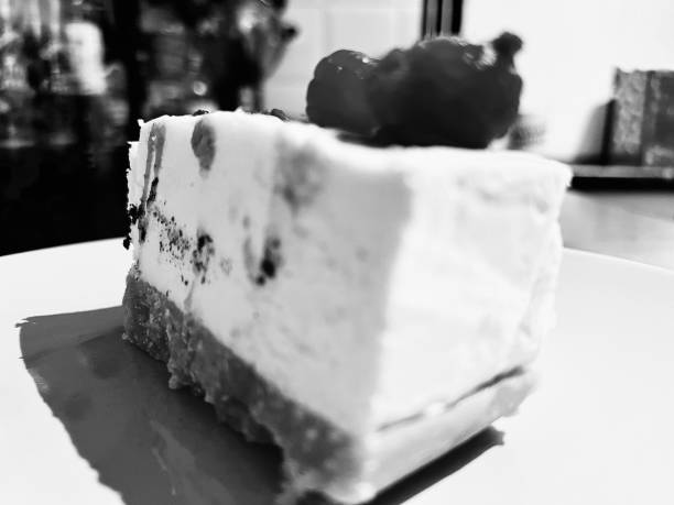 A slice of cheesecake topped with fresh berries