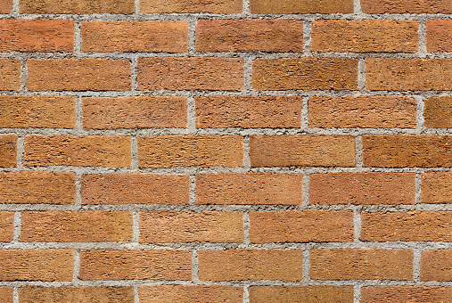 Repeating brown brick wall texture typically found in developed areas, often around the back of buildings in cities. The file is a seamless texture, allowing the picture to be tiled, in order to create the effect of much bigger wall.