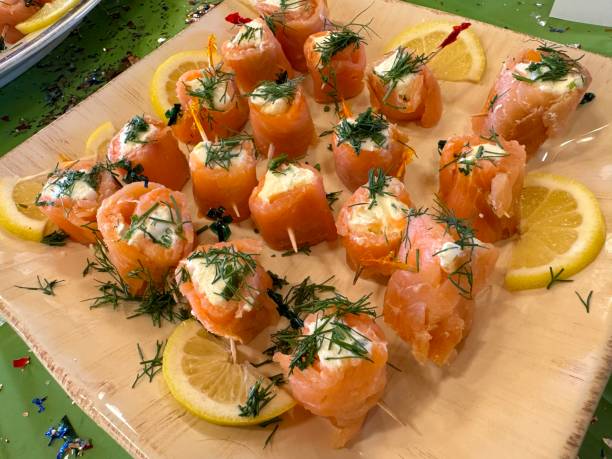 istock Homemade salmon cream cheese rolls on a serving platter 2143297924