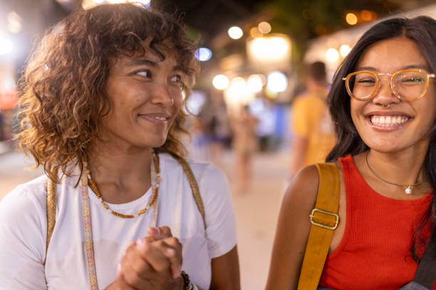 istock Two lesbians walk through the city 2143311508