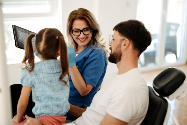 istock Little girl visiting a dentist 2143377306
