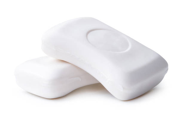 istock Side view of two bars of dry white soaps in stack isolated on white background with clipping path 2143380989