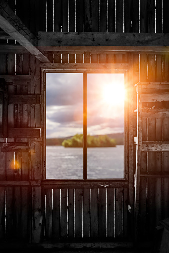 View out of the window onto a lake in Sweden