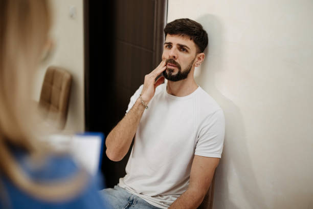 istock Man in the dentist's waiting room 2143385769