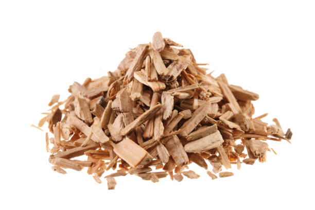 istock Pile of cedar wood chips (Cedrus), isolated on white background 2143411226