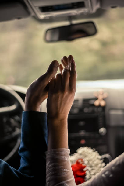 a woman and a man in a car