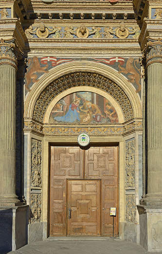Decorated entrance portal to the Cathedral of Santa Maria Assunta of Aosta comes from the V-XIX century, the Valley of Aosta, north of Italy