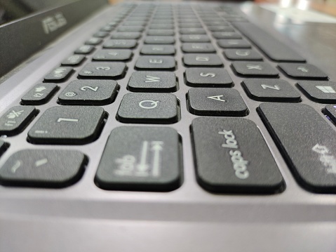 Close up image of a black personal computer keyboard.