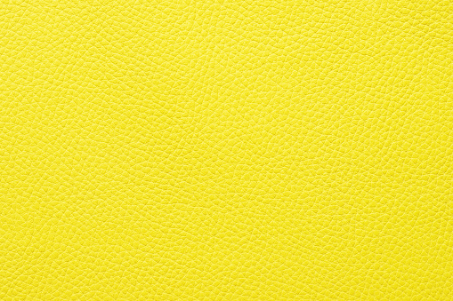 yellow animal skin with natural pattern, leather background