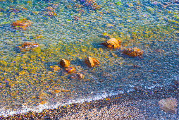 emerald sea cost with heap of stones