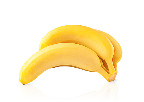 A bunch of fresh bananas isolated on a white background with reflection and full depth of field.