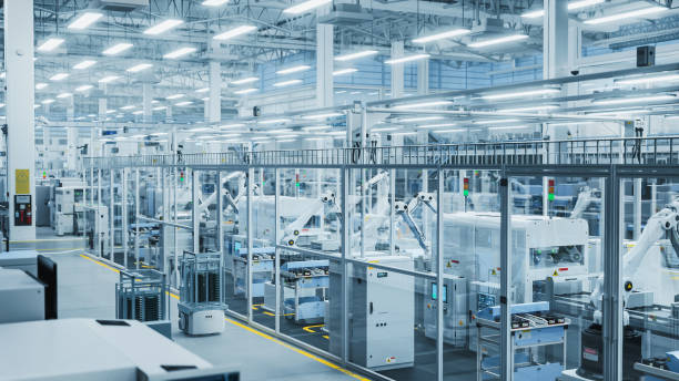 istock 3D Render: Advanced Robot Arm Conveyor Line Manufacturing Electronics Enclosure Boxes. High Angle Shot with Artificial Intelligence Assembly Line Building High-Tech Products for Technology Industry. 2143487899