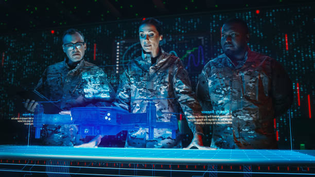 istock Futuristic Warfare Strategy: Military Intelligence Experts use Holographic Augmented Reality Table With Blueprint of Drone. Army Reconnaissance Use 3D Surveillance Tech, Data Analysis to Win War 2143503396