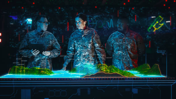 istock Futuristic Warfare: Top Military Intelligence Specialists use Augmented Reality Holographic Table Map to Scan Enemy Terrain. Army Recoinessance Using Sattelite Surveillance Analysis Technology 2143503916