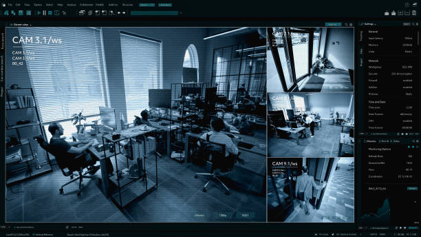 istock Surveillance Camera CCTV Footage, Multiple Screens Show People working in the Office. High Tech Security and Data Protection Mock-up. Screen Replacement Template for Computer Displays 2143506582
