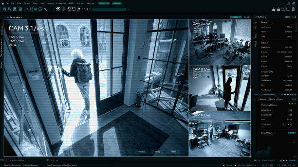 istock Surveillance Camera CCTV Footage, Multiple Screens Show People working in the Office. High-Tech Security and Data Protection Mock-up. Screen Replacement Template for Computer Displays 2143507616