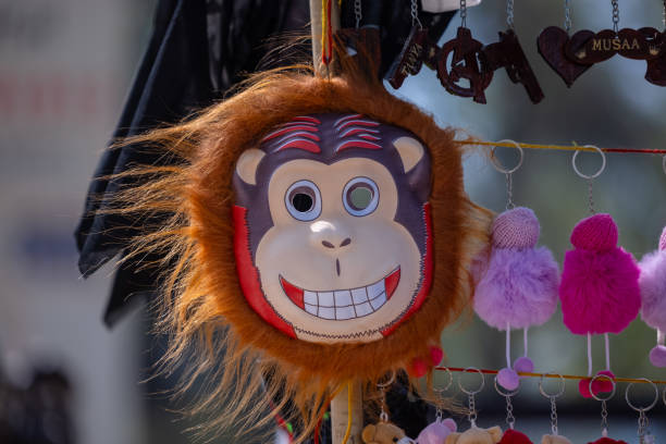 Handmade face mask with colors on display for sale.