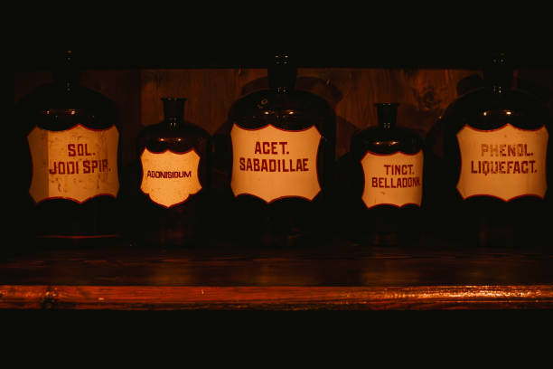 istock Multiple pharmaceutical liquids on a shelf in an old pharmacy basement 2143591580