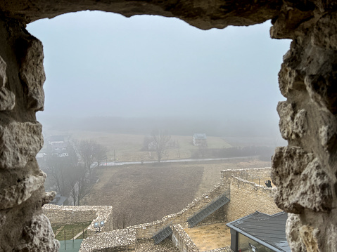 Castle ruins in Rabsztyn in Poland in foggy weather. The facility near Olkusz was partially rebuilt and made available on the Eagle's Nests trail on the Krakow-Czestochowa Upland.
